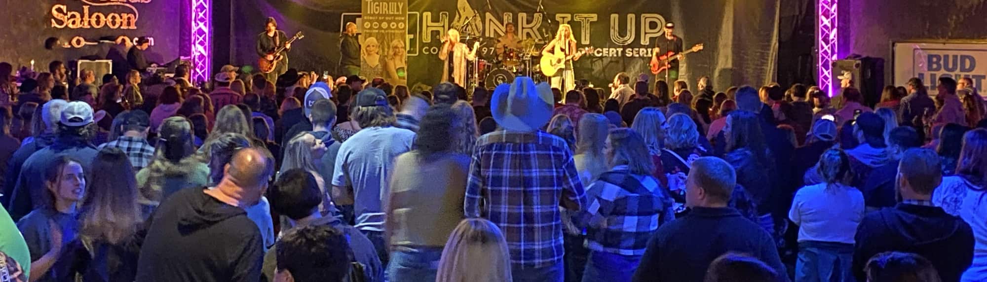 country concert with fans wearing cowboy hats Santa Rosa